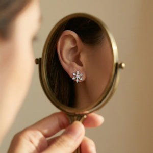 Close Up of Astra 925 Sterling Silver Star Stud Earrings