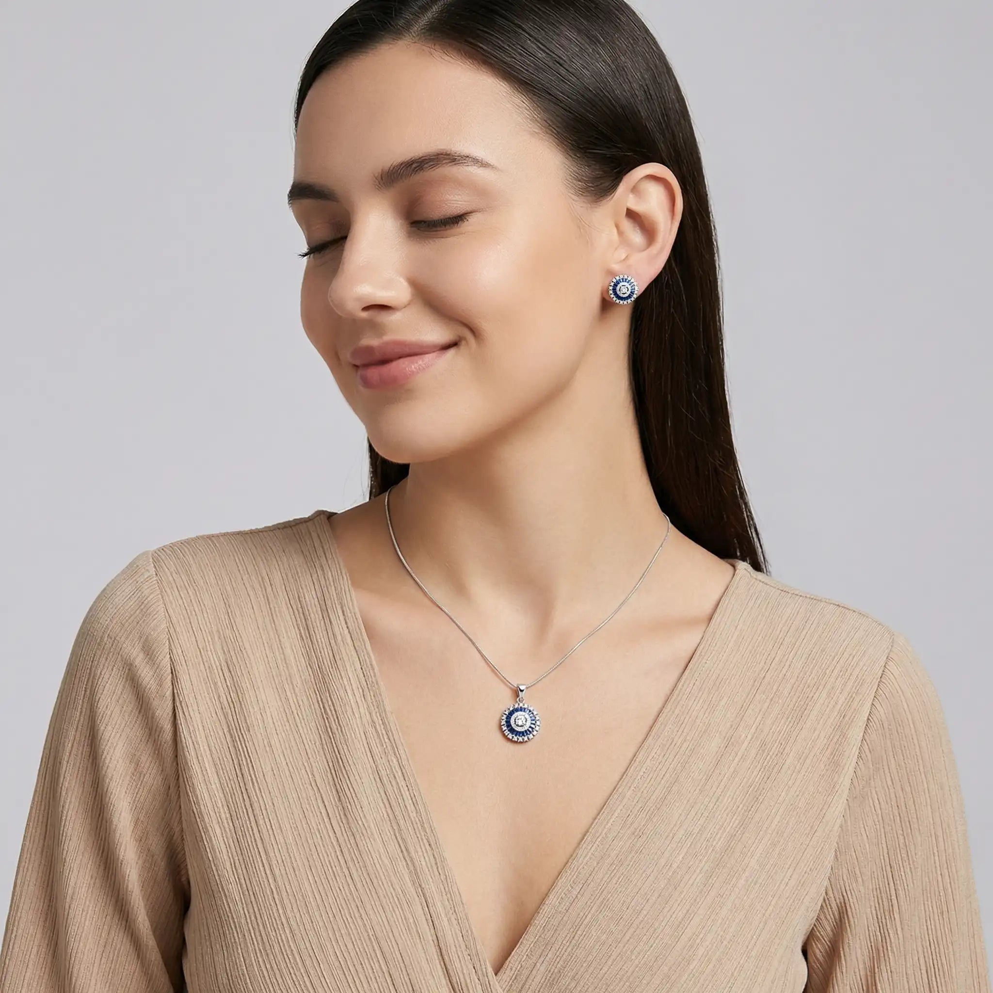 Woman Wearing Blue Zaria Radiant Circle Pendant Set