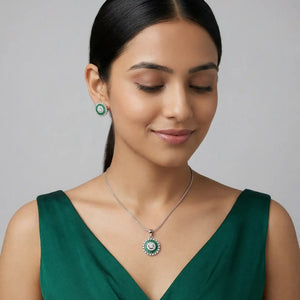 Woman Wearing Green Zaria Radiant Circle Pendant Set