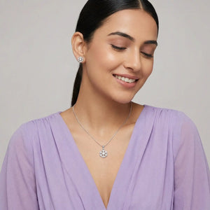 Woman Wearing Snowflake Sterling Silver Pendant Set